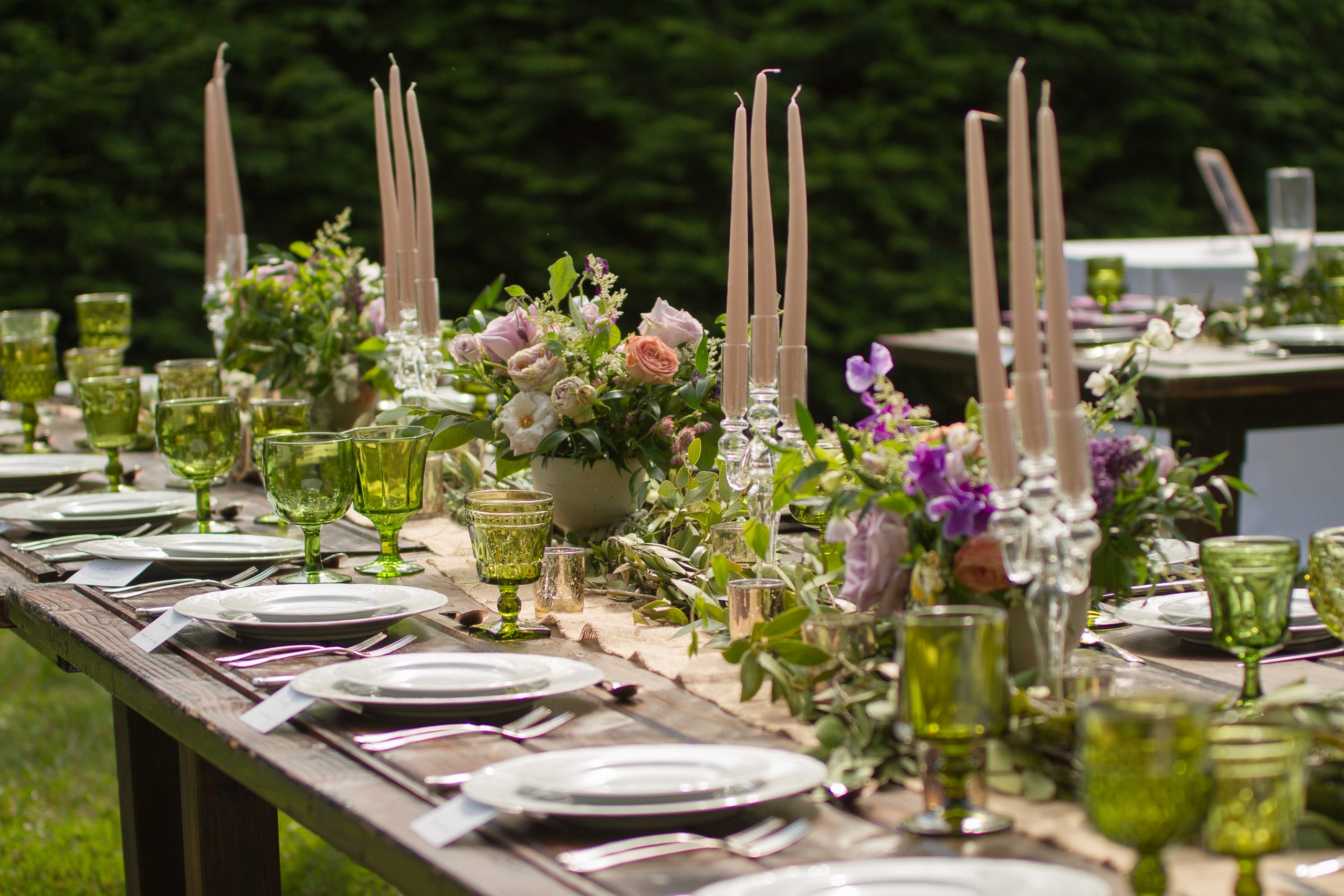 Candlesticks are traditional but easy simple centerpieces. They add height and beauty.