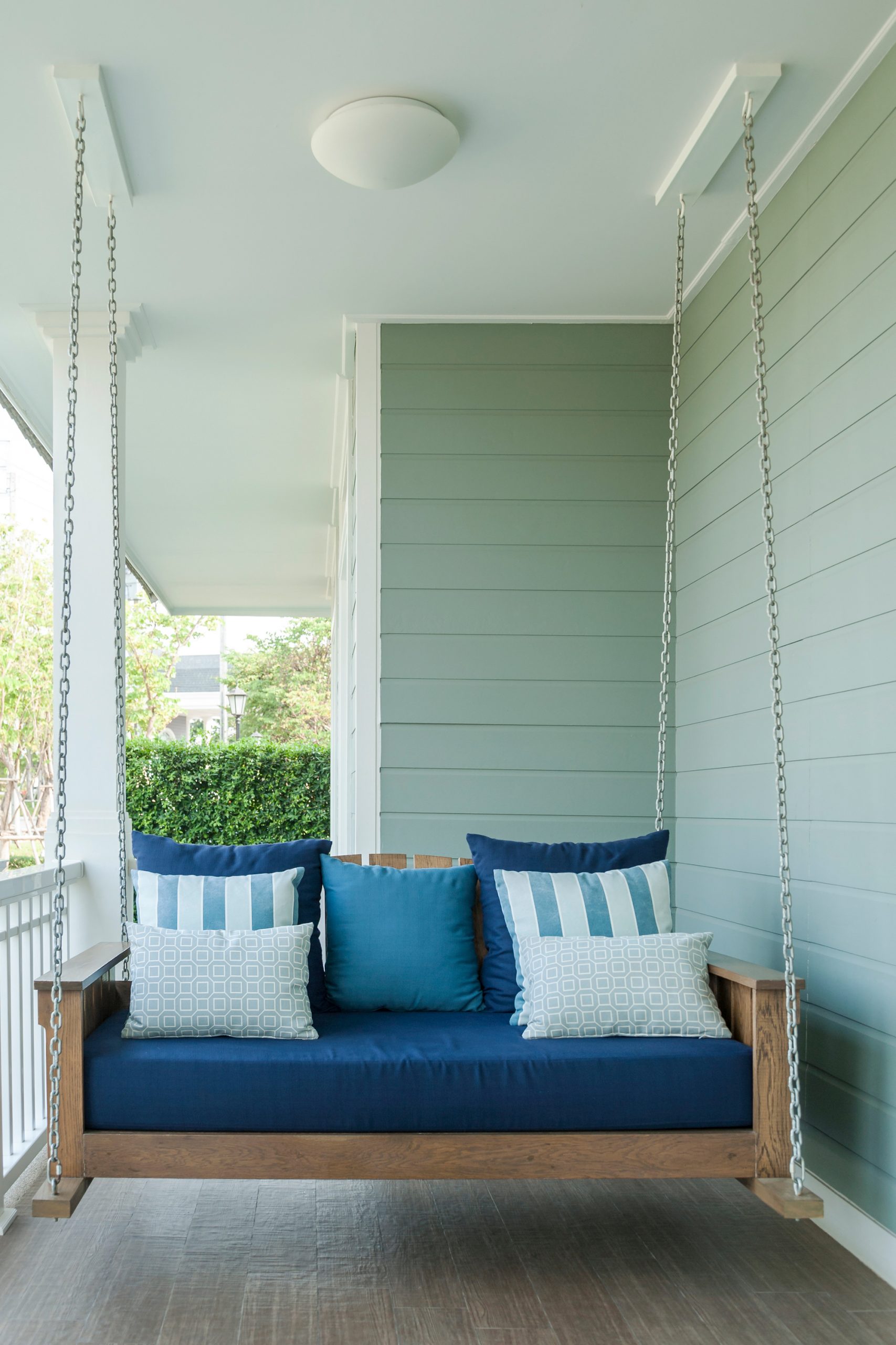 porch swing with lots of pillows