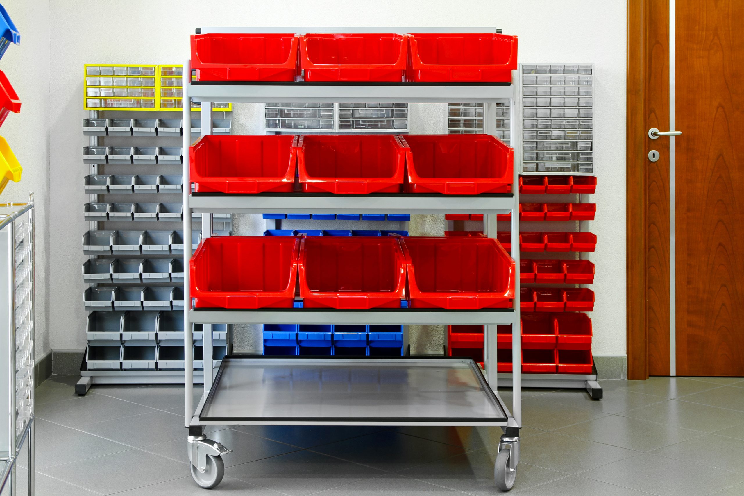 Hardware bins that were added to a garage. As fas as garage makeovers go, this is easy, but also makes such a clean look keeping everything so organized.