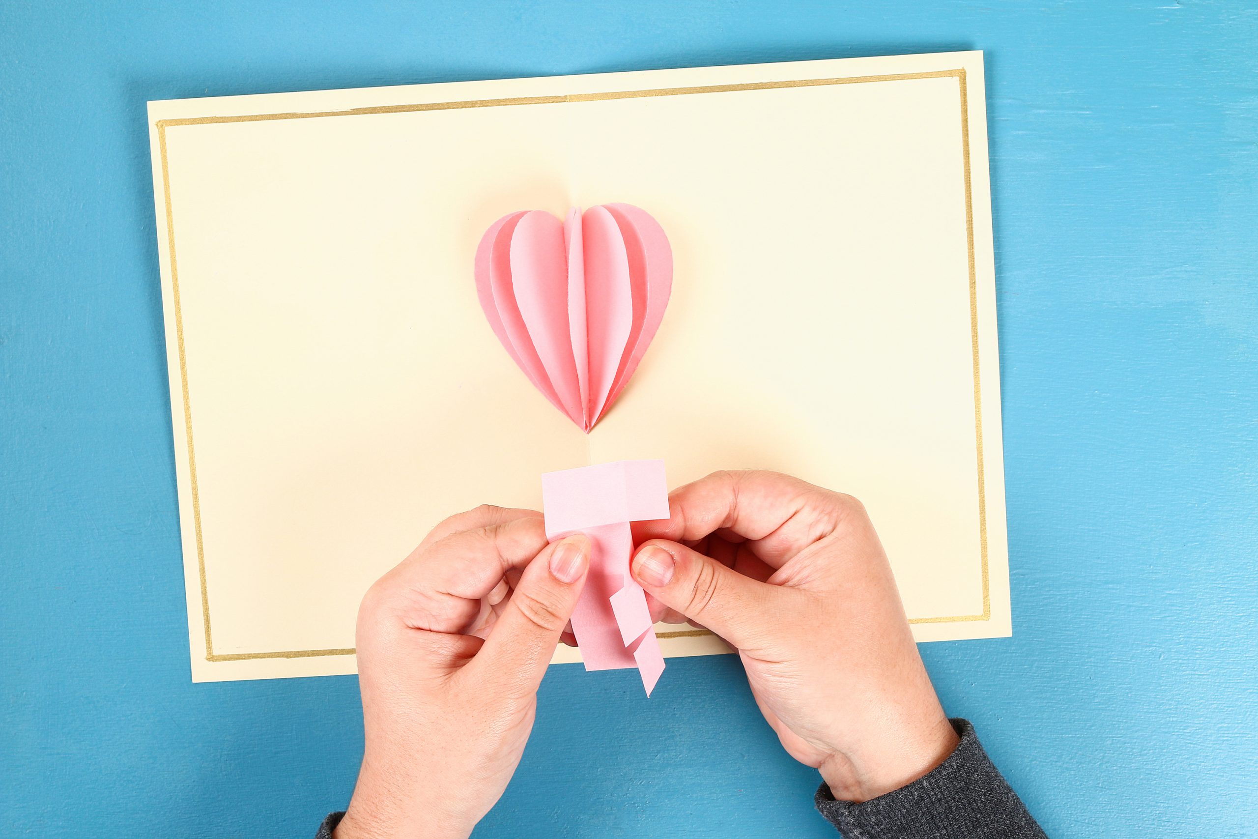 Pink folded paper heart. Diy ideas for Dollar Store Valentines.