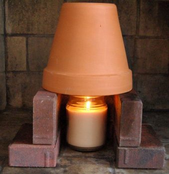 36-cold-weather-hacks-to-keep-you-cozy-this-winter-terra-cotta-pot-heater