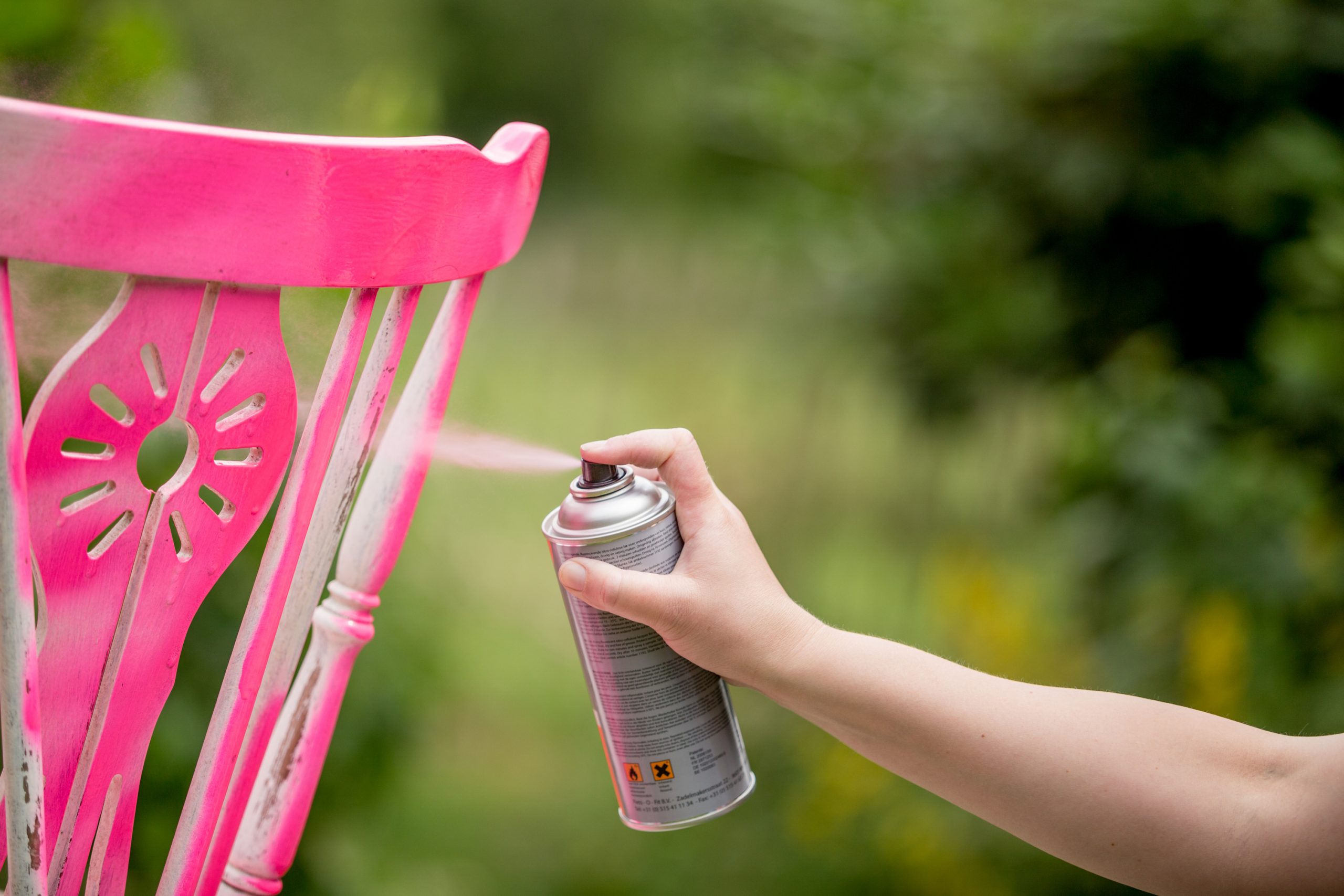 Tips about how to spray paint wood furniture! This example shows a wood chair being painted.